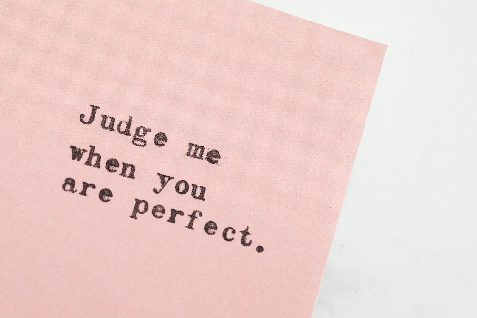 typed message on pink paper