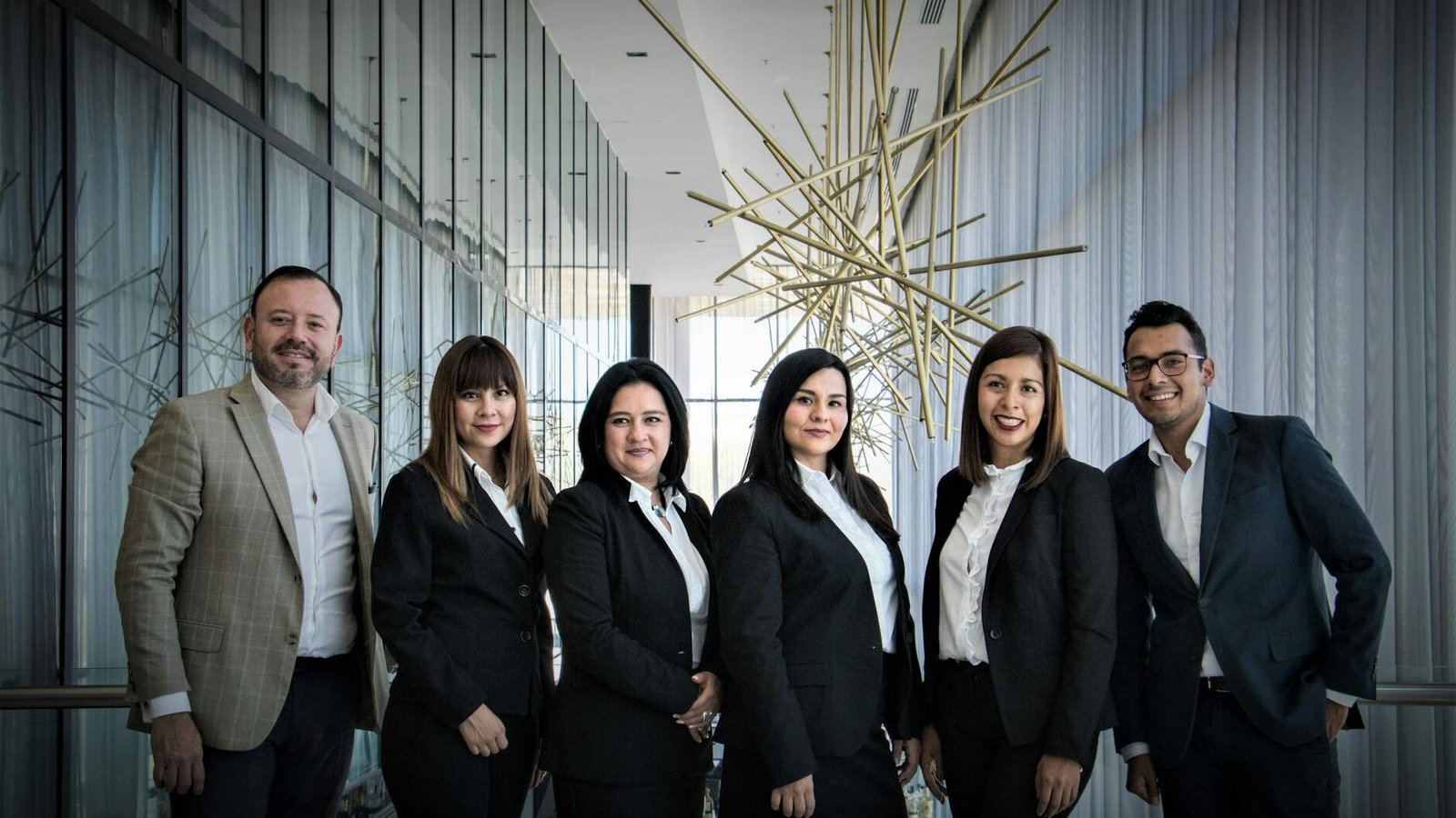 group of people in dress suits